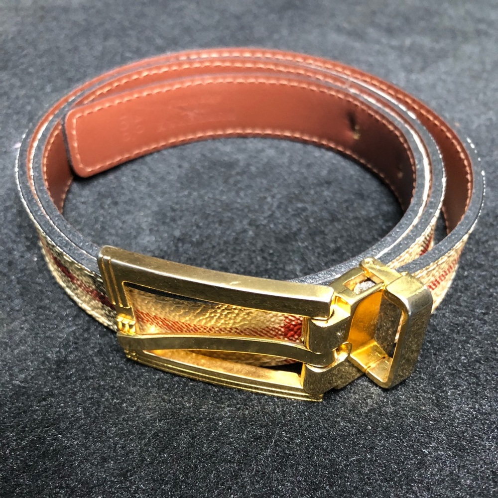 Burberry Belt trimmed, 33 inches.